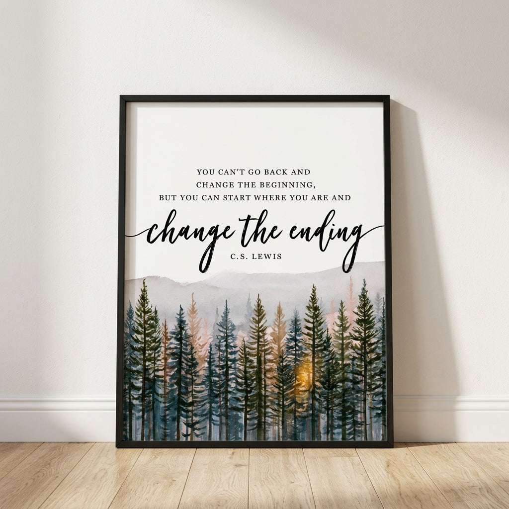 A framed art print leaning against a white wall on a light wood floor. The print features a black frame, a quote by C.