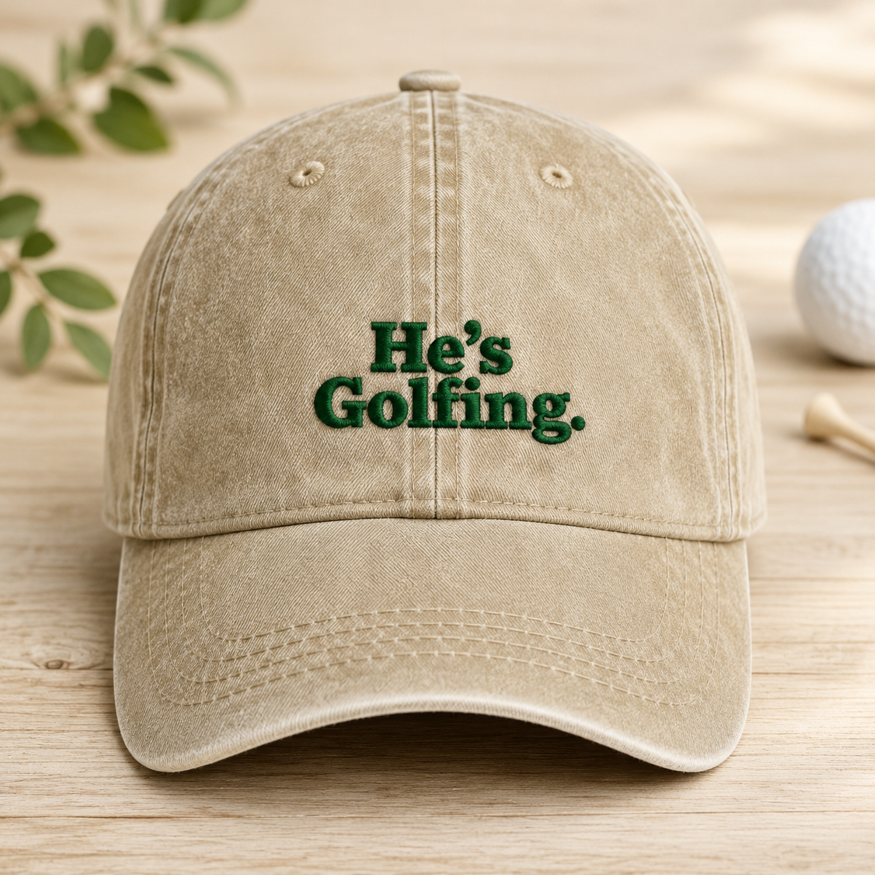He's Golfing Washed Cap, Funny Embroidered Golf Hat for Dad - Washed Cap - front view