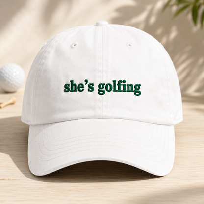 She's Golfing Washed Cap, Funny Golf Hat for Women Golfers - Washed Cap - front view
