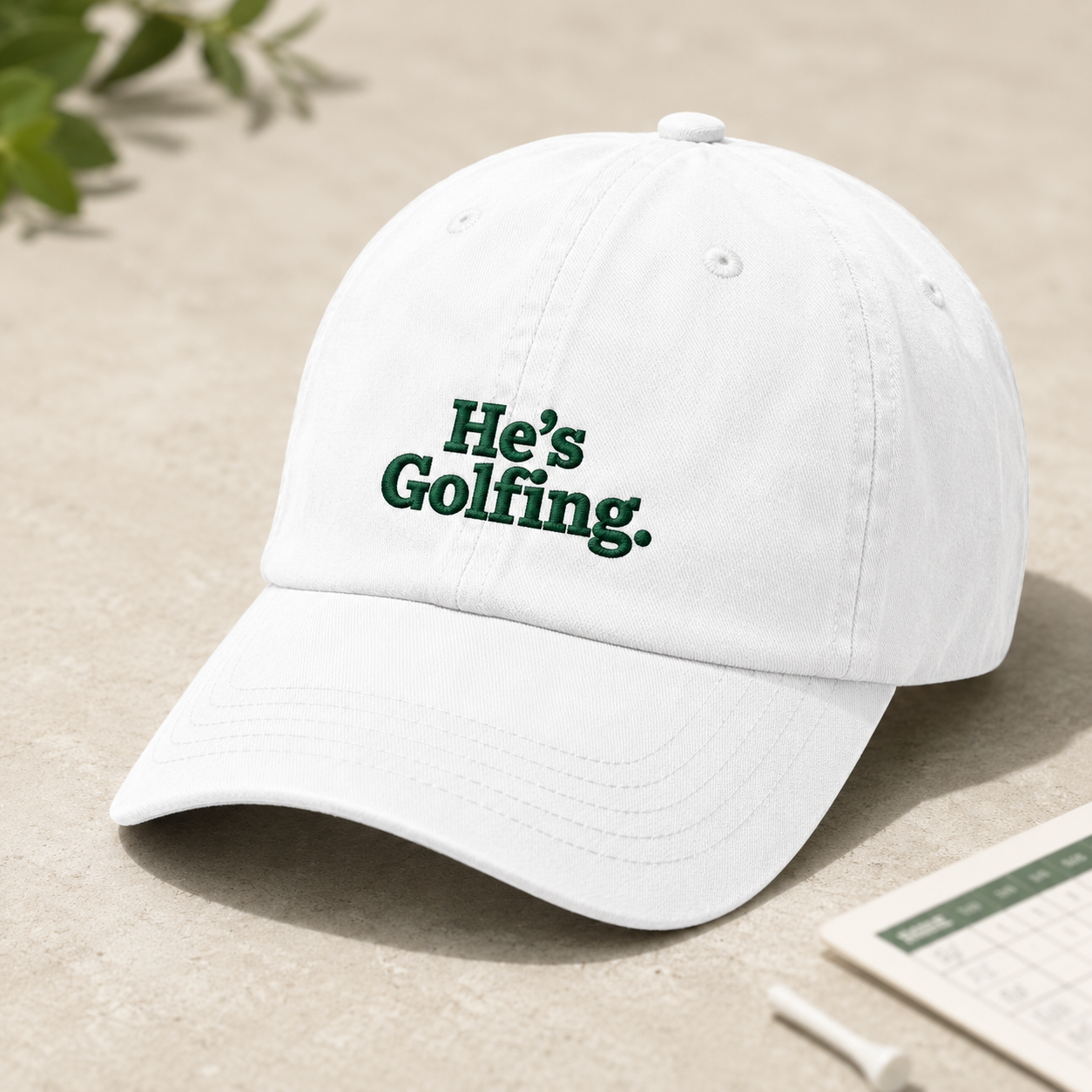 He's Golfing Washed Cap, Funny Embroidered Golf Hat for Dad - Washed Cap - detail view