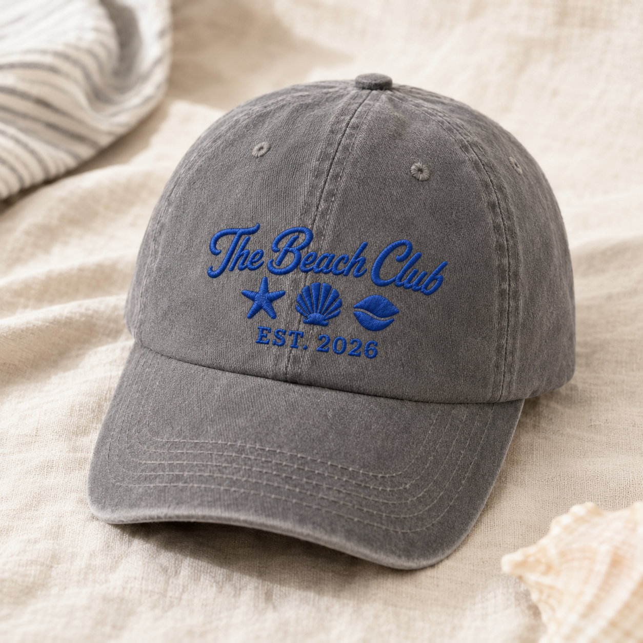 The Beach Club Washed Cap, Embroidered Coastal Hat with Est 2026 Seashell Art - Washed Cap - lifestyle view 2