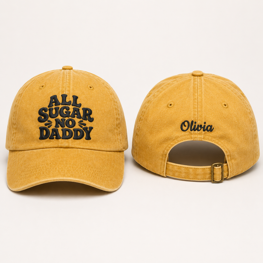 Front and back view of a yellow washed baseball cap with funny black embroidery and custom name Olivia text