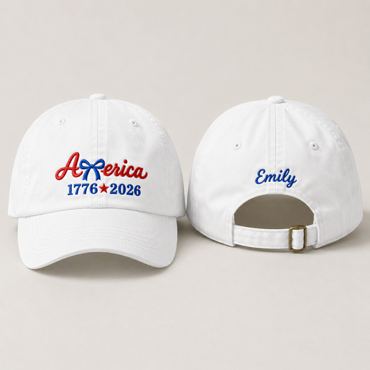 Front and back view of a white washed baseball cap with red America embroidery and custom name Emily script
