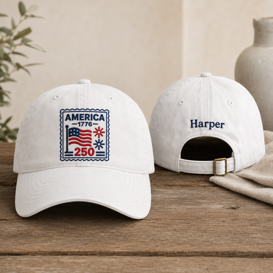 Front and back view of a white washed baseball cap with embroidered America 250 stamp design and custom name Harper text