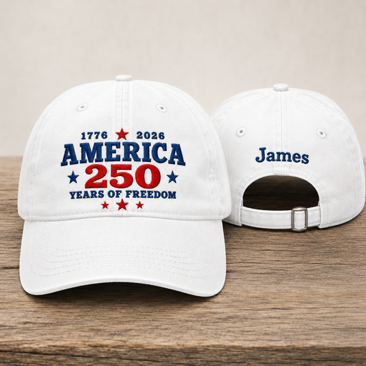 Front and back view of a white washed baseball cap with embroidered blue and red America 250 years of freedom text design and custom name James