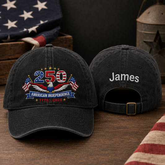 Front and back view of a black washed baseball cap with embroidered 250 american independence eagle design and custom name James text