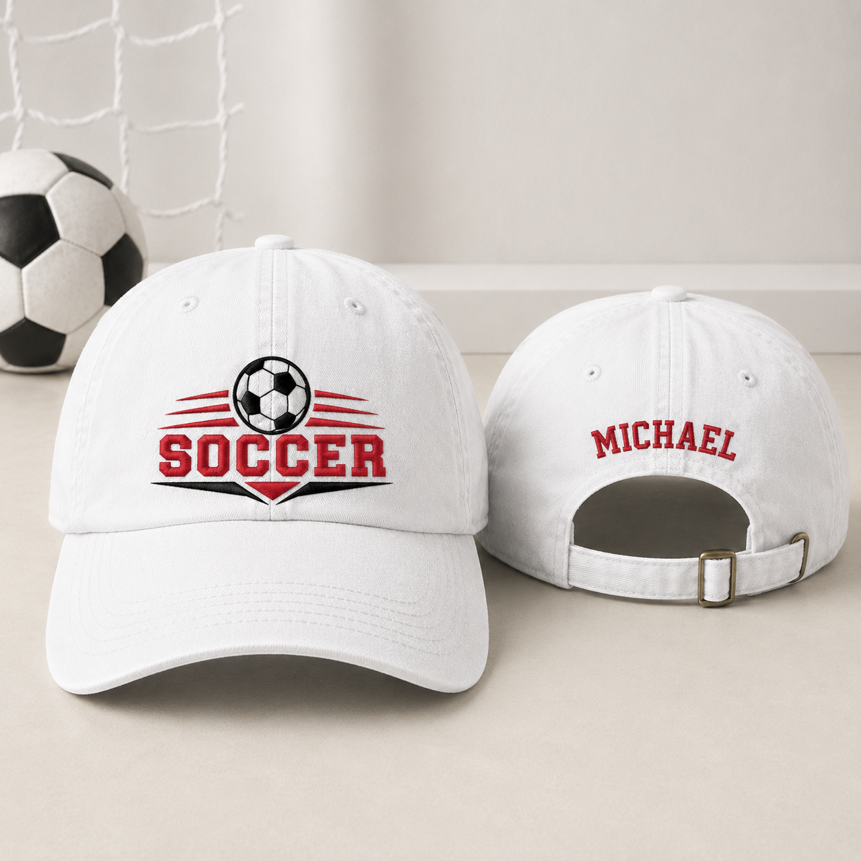 Front and back view of a white washed cotton baseball cap featuring an embroidered graphic soccer ball logo and custom name Michael text