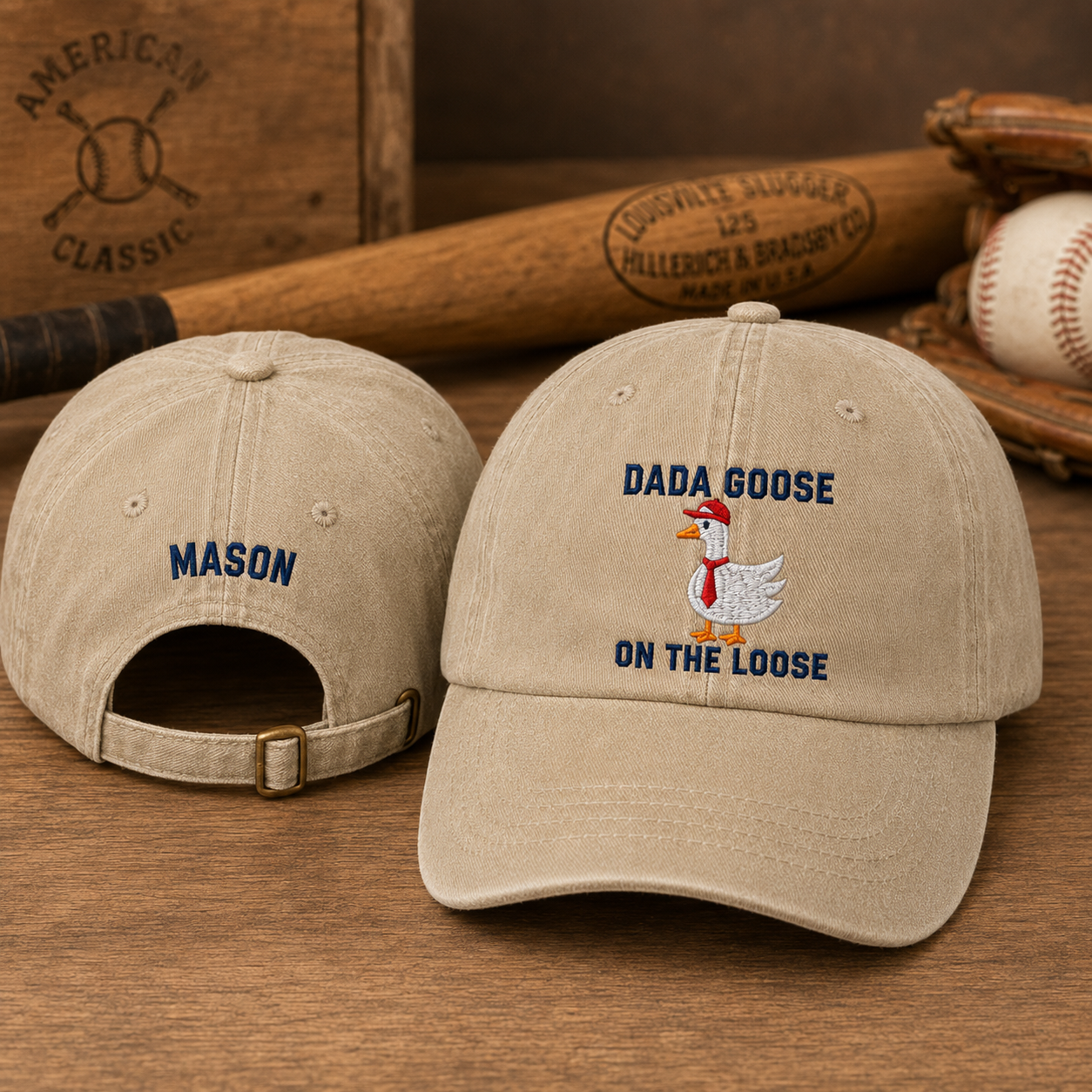 Front and back view of a sand washed baseball cap featuring an embroidered cartoon dad goose in a red tie and custom name Mason text
