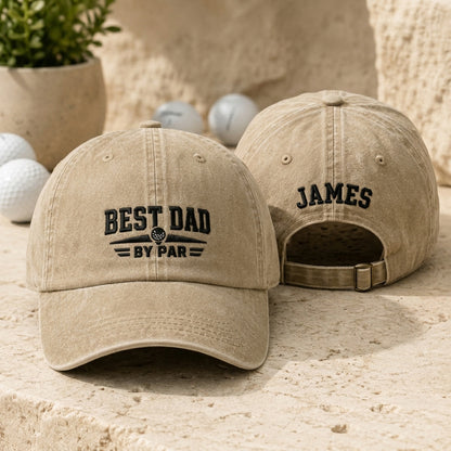 Front and back view of a sand washed baseball cap with black embroidered golf best dad by par design and custom name James