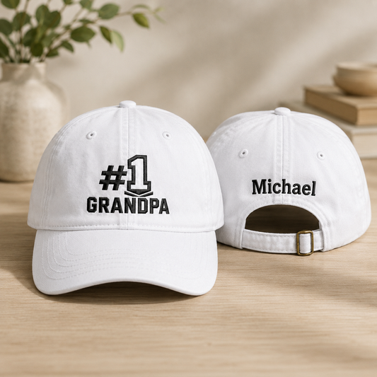 Front and back view of a white washed baseball cap with black embroidered number one grandpa design and custom name Michael
