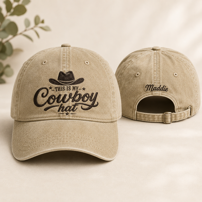 Front and back view of a sand washed baseball cap with western cowboy embroidery and custom name text