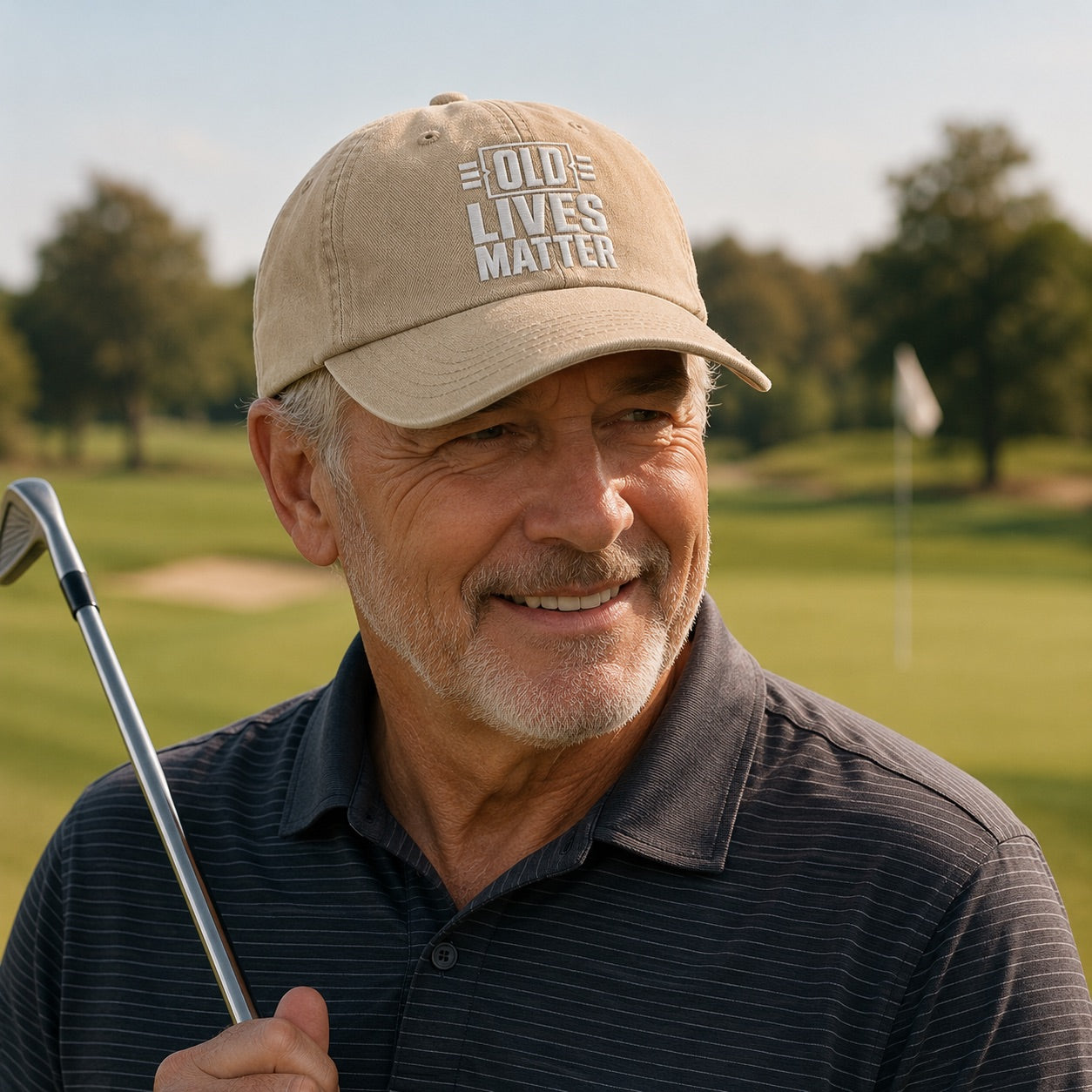 Man on a golf course wearing a cap with 'OLD LIVES MATTER' text