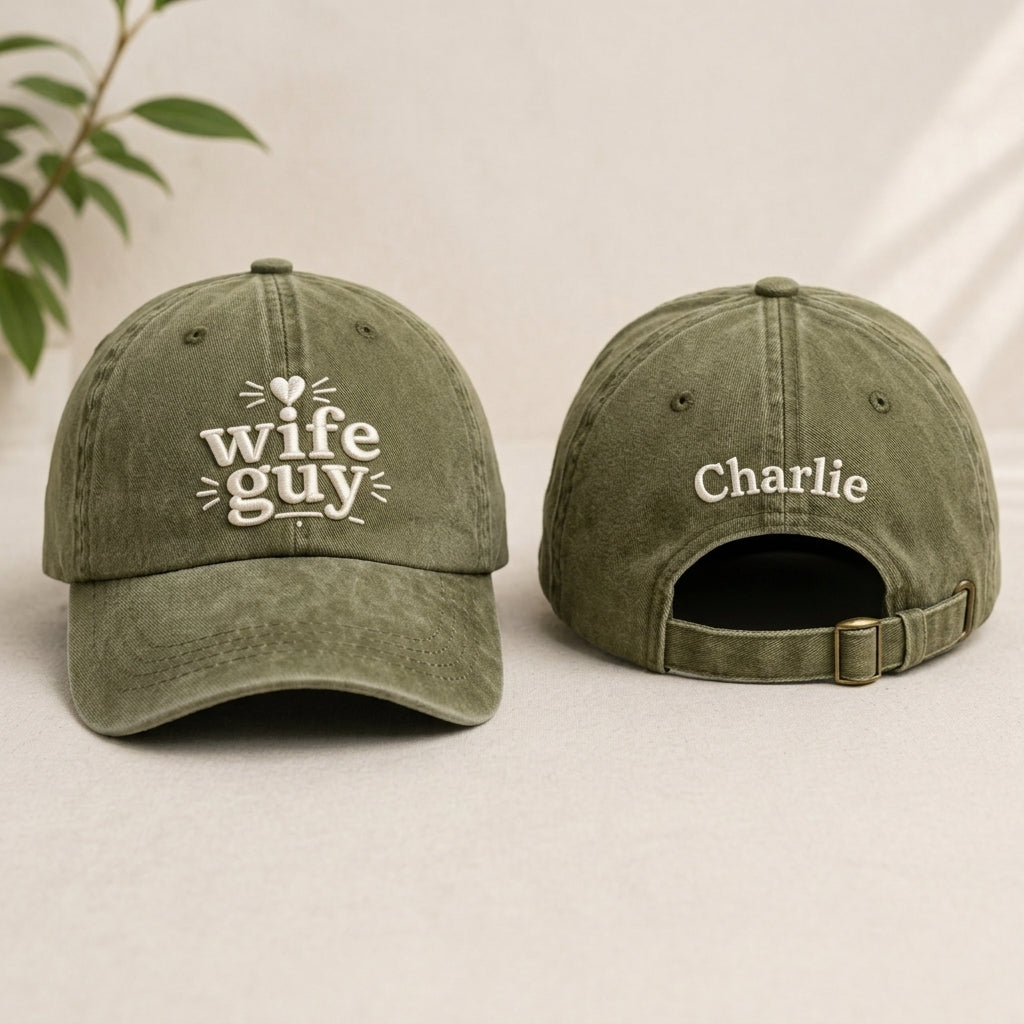 Two green baseball caps with 'wife guy' and 'Charlie' text on a light background.