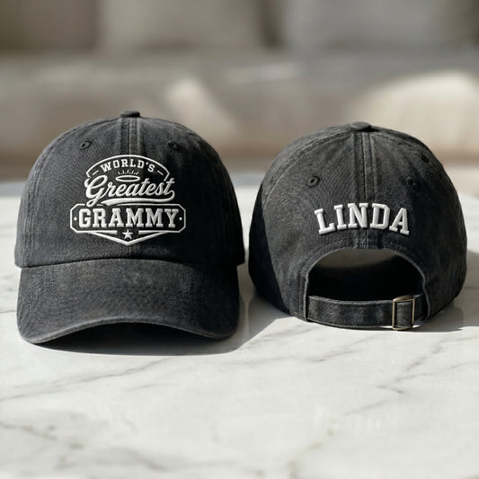 Black washed cotton baseball cap with World's Greatest Grammy embroidery and custom name Linda text.