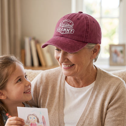 Maroon washed baseball cap with white embroidered Greatest Grammy artwork worn by a grandmother.